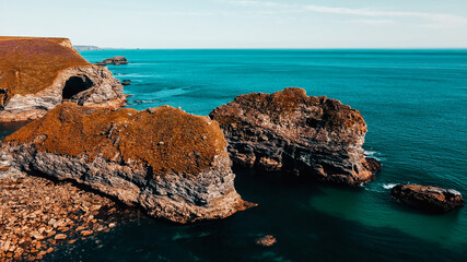 Obraz premium Seascape of the Atlantic Ocean bay with rocks above the water. Aerial view