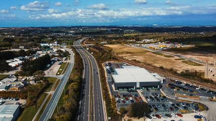 Fototapeta premium Cars are moving on the highway Parking with many different vehicles