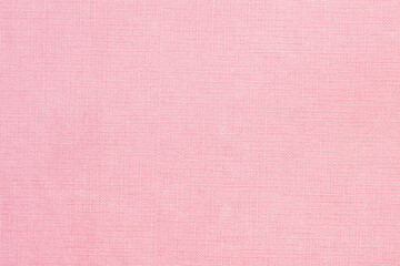 Canvas fabric texture in pink color, abstract background
