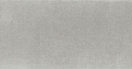 Grey natural sackcloth, canvas with visible texture. Closeup of jute