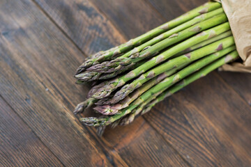 Fresh green asparagus wooden background
