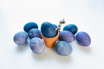 Space colored eggs on white background.