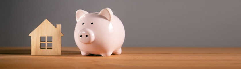piggy bank with house model,