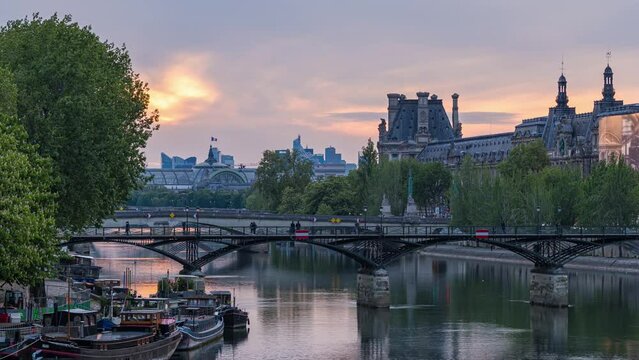 Cloudy Sunset Over Paris Touristic and Famous Center Seine River and Lights Reflections