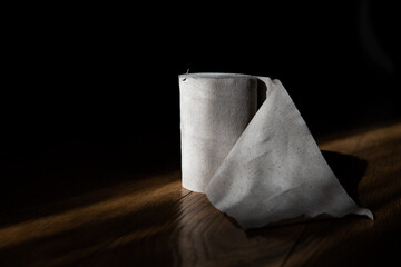 cheap toilet paper in contrasting light