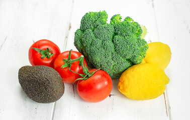 mix of vegetables on light wooden background