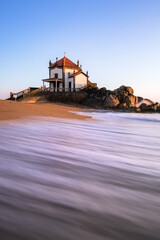 Fototapeta premium Senhor da Pedra church at the coast