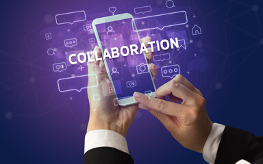 Hand using smartphone with social media concept