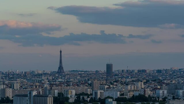Eiffel Tower and Cityscape of Paris in a Sunny and Cloudy Day From Above