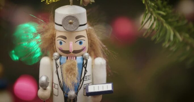 Christmas holiday tree ornaments medical doctor nutcracker close up face