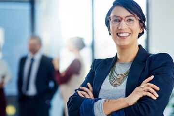 Success is second nature to me. Cropped shot of a businesswoman standing with her arms crossed and...