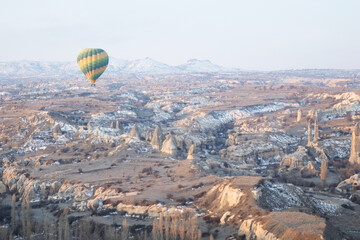 Hot Air Balloon flying at sunrise in Cappadocia, Turkey