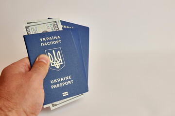 The man has three Ukrainian passports to travel abroad with cash in dollars.
