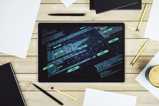 Modern digital tablet monitor with abstract programming language, research and development concept. Top view. 3D Rendering