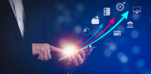 Startup arrow concept with icon business and network connection on modern virtual interface from digital tablet.Businessman Touching tablet and graph Screen Icon of media screen, Technology Process
