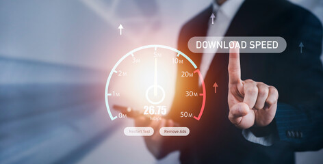 Businessman touch Fast internet connection with download speed concept, Hand holding smartphone and Virtual screen of Internet speed measurement,Internet and technology concept, 5G Hi speed internet.