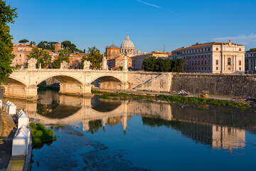 Fototapeta na wymiar Ponte Vittorio Emanuele II is a bridge in Rome constructed to designs of 1886 by the architect Ennio De Rossi
