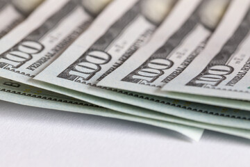 US currency, 100 dollars banknotes, one hundred dollars arranged symmetrically