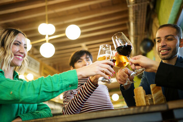 Man and women proposing toast during party