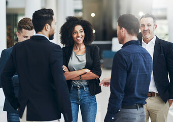 Glad to see everyone here. Shot of a group of businesspeople having a discussion together at work...