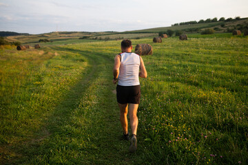 man running  at sunset healthy active lifestyle