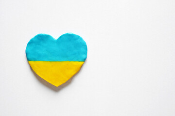 heart in the color of the flag of Ukraine on a white background. support for Ukraine in the war