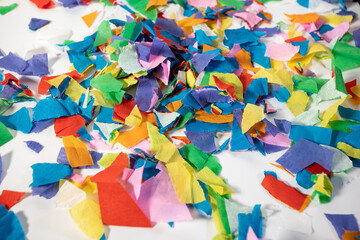 pile of small confetti on white background