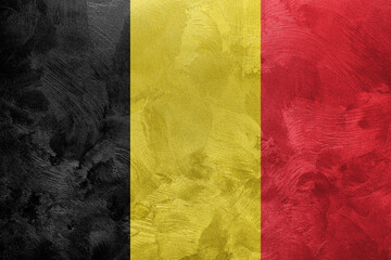 Textured photo of the flag of Belgium.