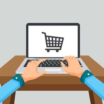 Online shopping concept with person and laptop. Shopping cart on the screen for online purchase.