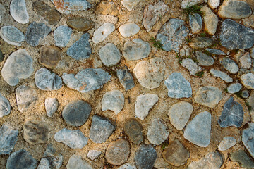 Texture of a stone wall. Old castle stone wall texture background. Stone wall as an abstract background or texture. Part of a stone wall, for background or texture