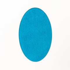 Fototapeta premium Blue easter minimal concept. Optimistic flat lay arrangements made of duck fluffy texture egg shaped with ow white background.