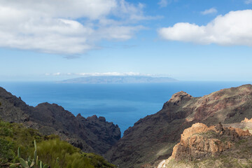 View on the Atlantic ocean and La Palma island from the Barranco Seco gorge, Tenerife, Canary islands, Spain