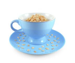 Oatmeal in blue bowl on plate with sprinkled dry oat flakes isolated on white background	 