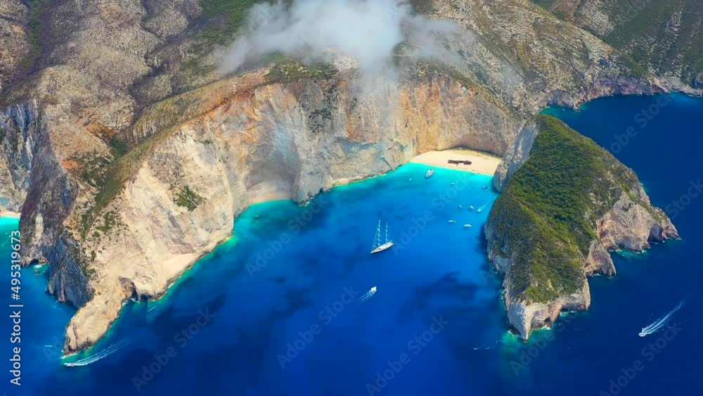 Wall mural navagio beach, zakynthos island, greece. aerial landscape. rocks and sea from the drone. summer land