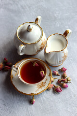 Obraz na płótnie Canvas Still life with cup of tea. Small ceramic cup close up photo. 