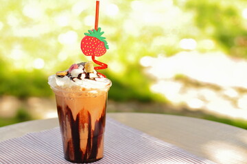 Chocolate and milk shake with cream and cookies