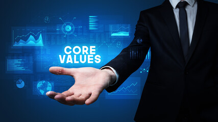 Hand of Businessman holding motivational message