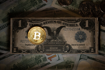 Bitcoin Dollar exchange market concept, shining gold bitcoin coin on 1 US Dollar