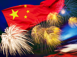 Waving chinese flag against sunset sky with colorful exploding fireworks. Celebration day of...