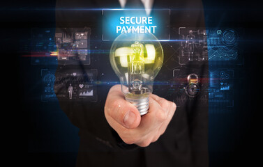 Businessman holding a light bulb, online security concept