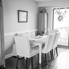 Black and white image of a dining room decorated for easter