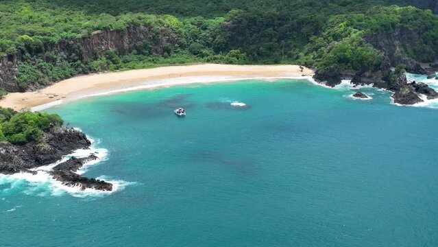 Seascape vulcano mountains and beach at archipelago of Fernando de Noronha Brazil. Tropical vulcano islands at Fernando de Noronha archipelago. Vacation travel. Tropical destination.  
