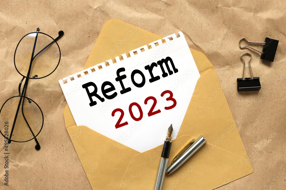 Poster reform 2023 text on paper on an envelope