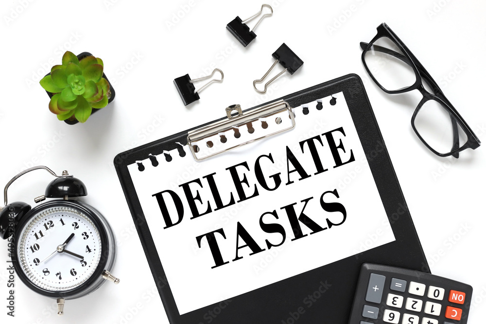 Poster delegate tasks white paper text on black folder