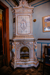 Old vintage ceramic fireplace at old mansion