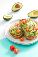 Avocado Toast
avocado toast topped with sprouts and cherry tomatoes