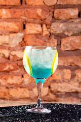 red, blue, white drink with ice classic cocktail glasses drink in the club caipirinha, negroni cold and in the glass. cocktails collection isolated on rustic background