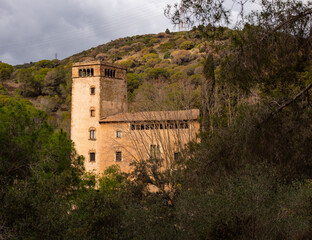 Fototapeta premium La Torre Pallaresa, Renaissance tower in valley above Santa Coloma de Gramanet, city in province of Barcelona, historical heritage of Spain