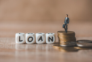Financial loan concept,  businessmen stand on money coin, loan money. loan officer