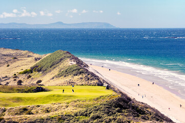 Royal Portrush Golf Club, Northern Ireland UK. The 5th hole of the Dunluce Links championship course above the White Rocks beach - Powered by Adobe